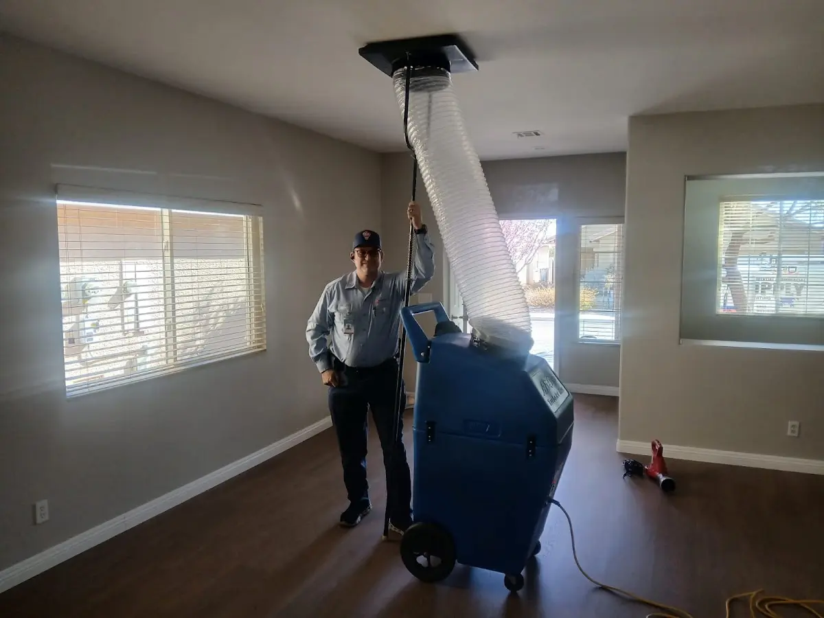 Professional Dryer Vent Cleaning work inside a Vinita home